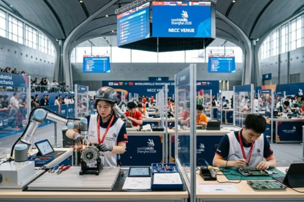 Young competitors working on technical skill challenges at WorldSkills Shanghai 2026 at the NECC venue