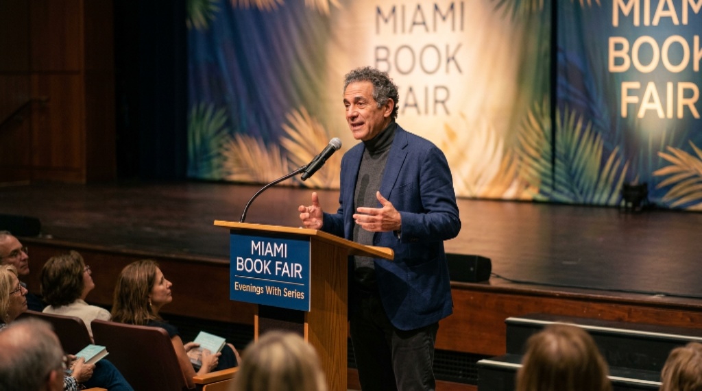 Author speaking at Miami Book Fair Evenings With series on stage